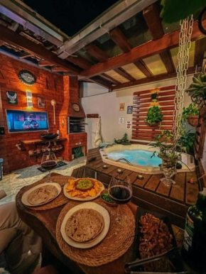 Sobrado de luxo com hidromassagem tripla e espaço gourmet à 5min da praia BC